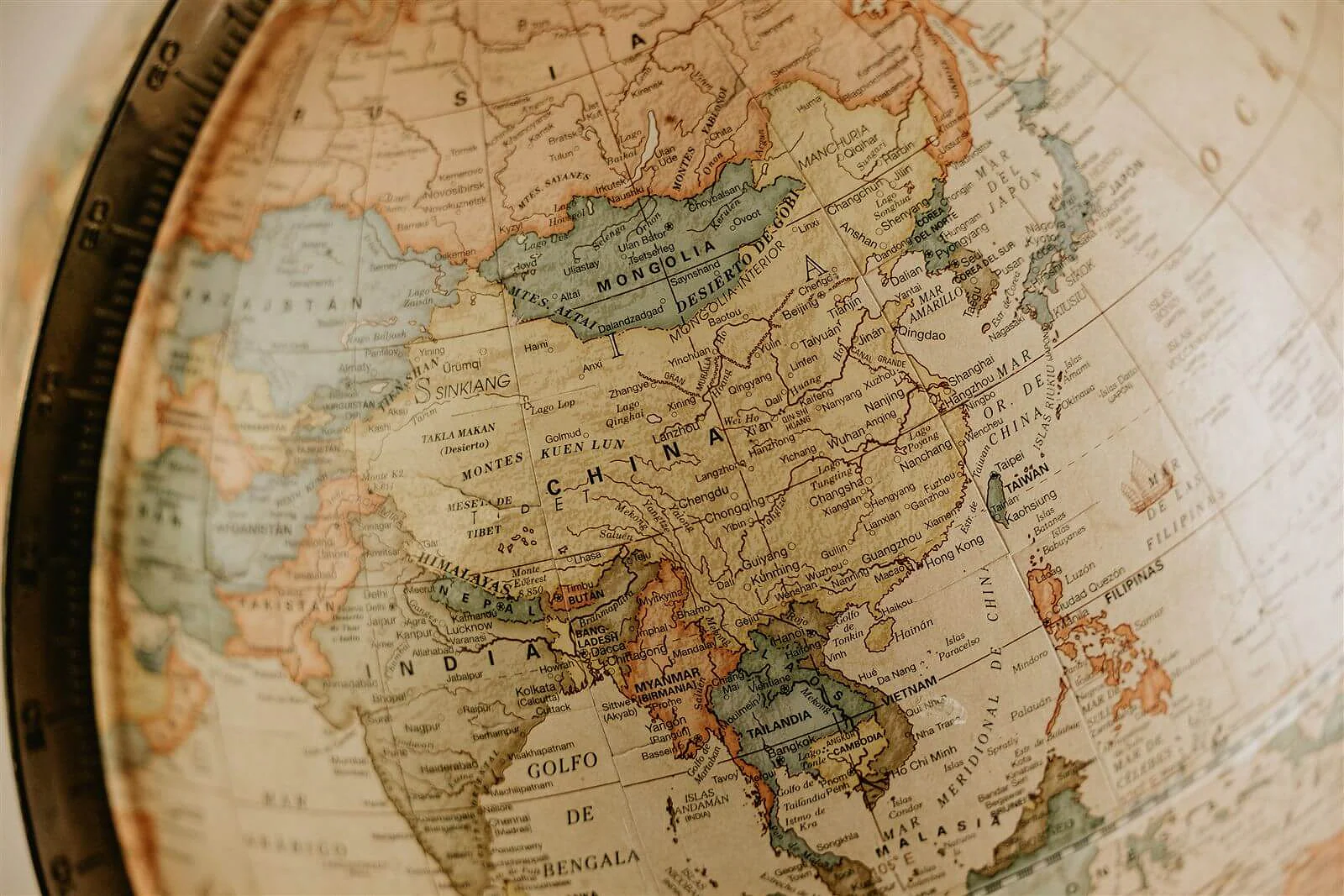 Vintage globe focused on China and Southeast Asia
